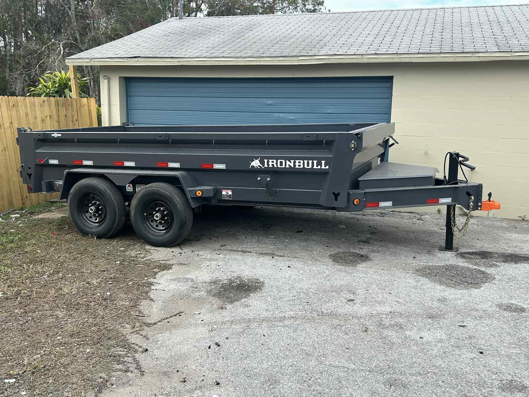 Dump trailer rental in Hudson, FL — hydraulic lift for debris removal